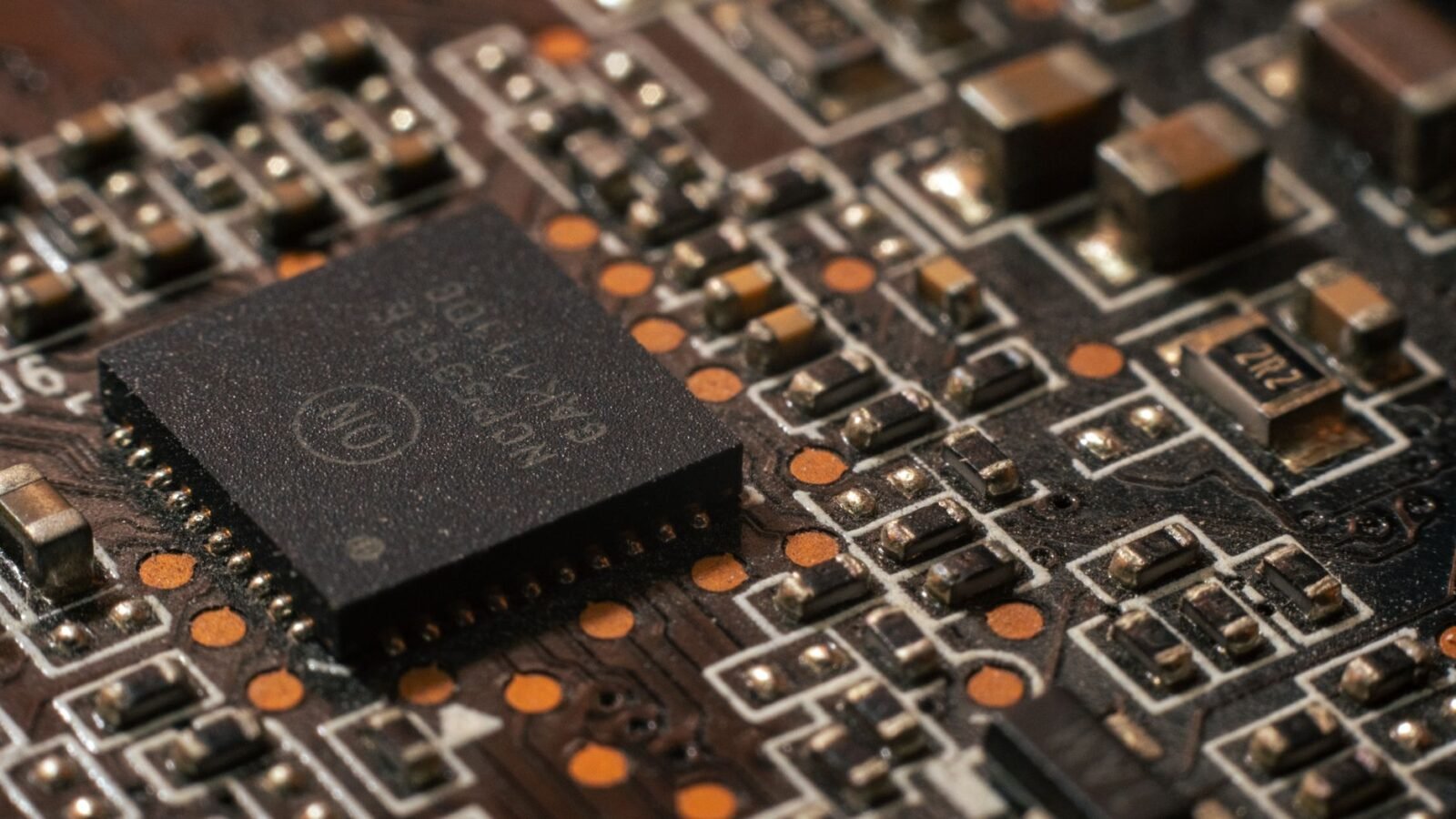 A glowing microchip representing the search for the next Nvidia of AI.