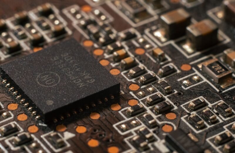 A glowing microchip representing the search for the next Nvidia of AI.