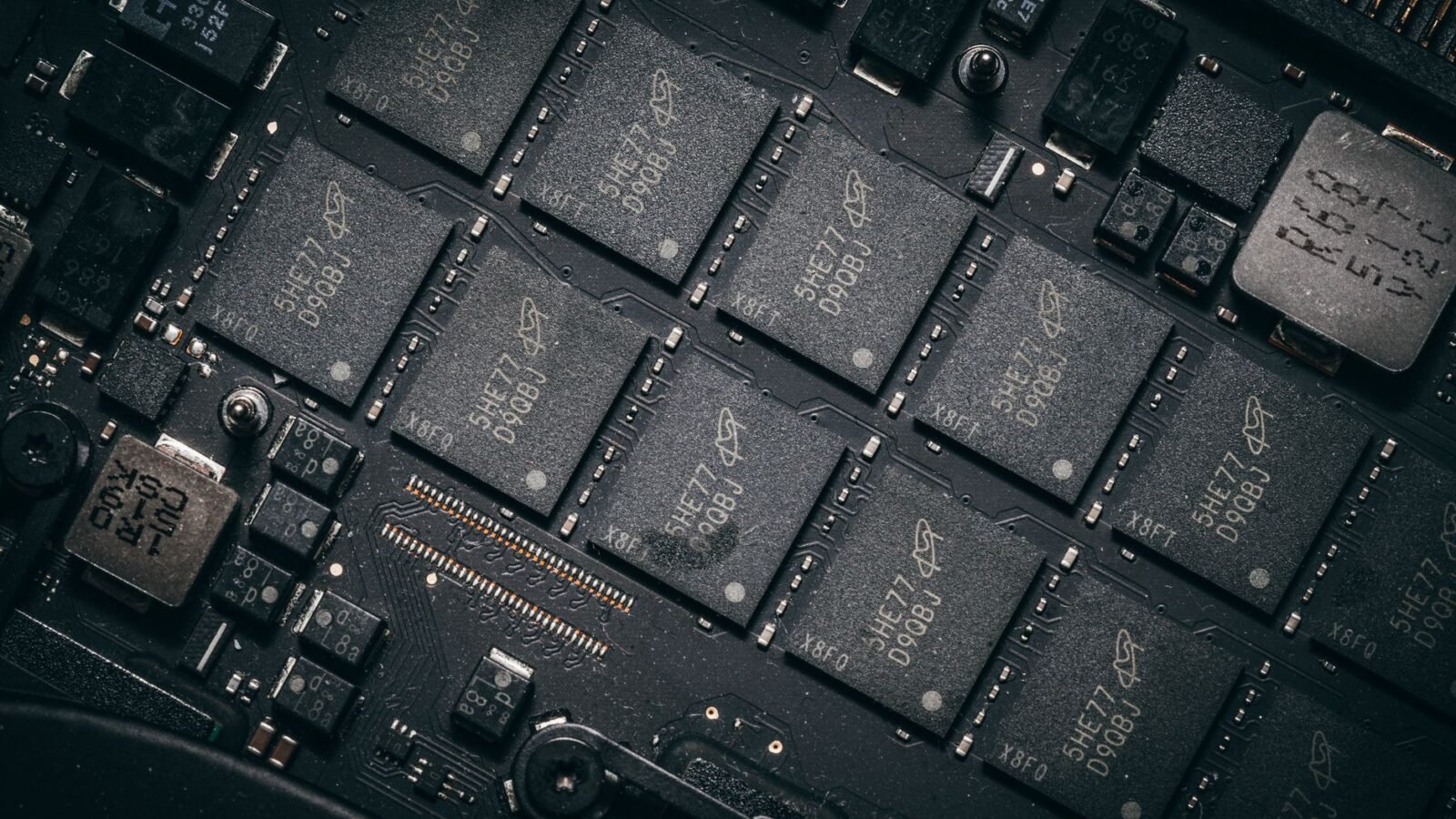 A modern data center and computer chip representing AI infrastructure.